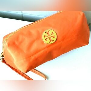 Tory Burch Vibrant Orange Pouch with Gold Emblem